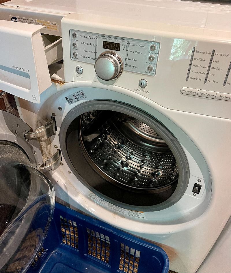 Laundry is located a few steps away in the rustic shed.