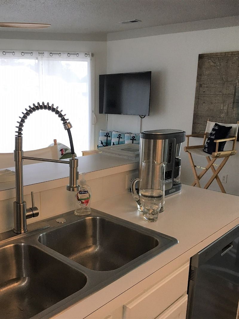 NESPRESSO and drip coffee makers are featured in our modern kitchen.