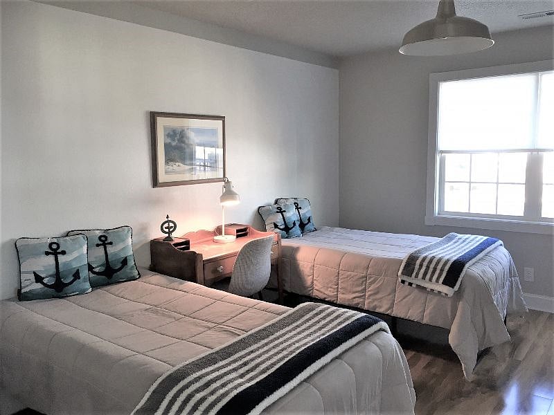 KING BED or 2 Twins with bedding provided, along with memory foam and pillow toppers.