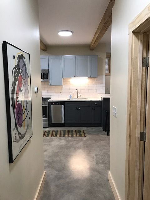 Kitchen from the hallway, BR #1 door on the right