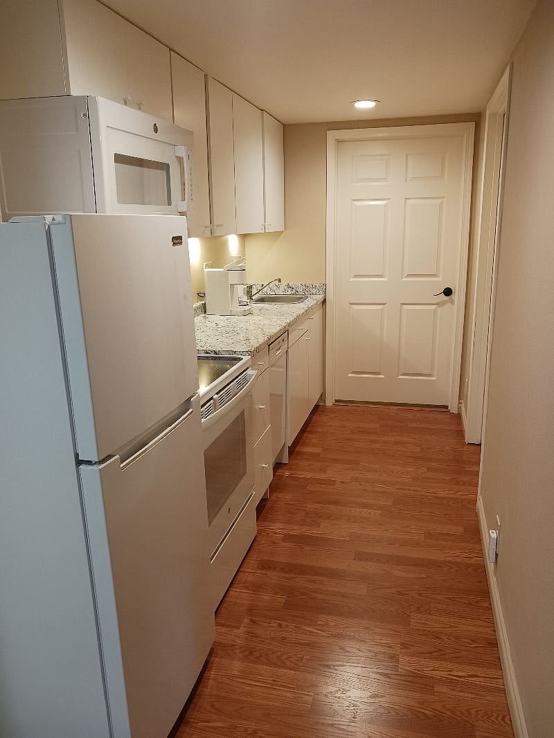 Full kitchen view from living room area