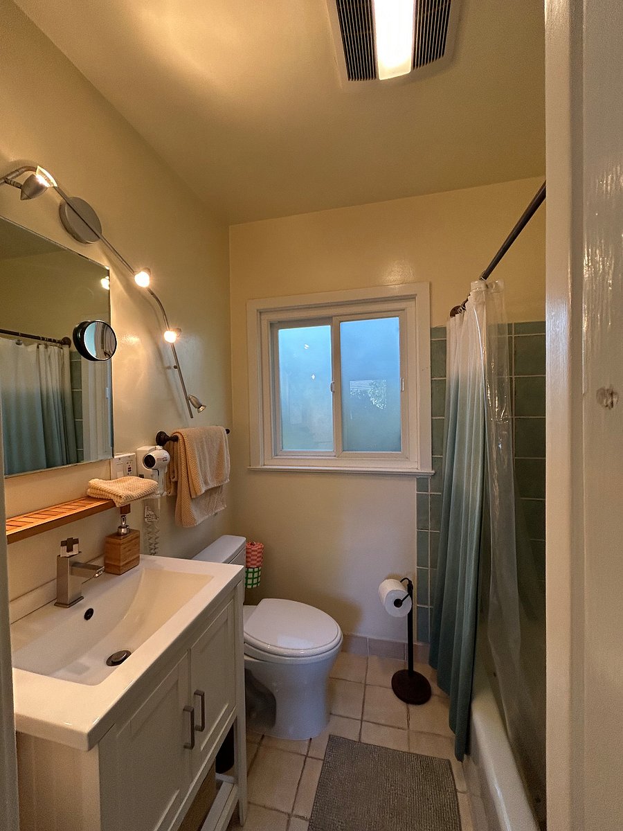 Bathroom with shower and bath