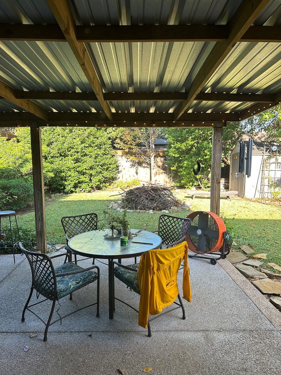 View of covered back patio from back living room door. 
