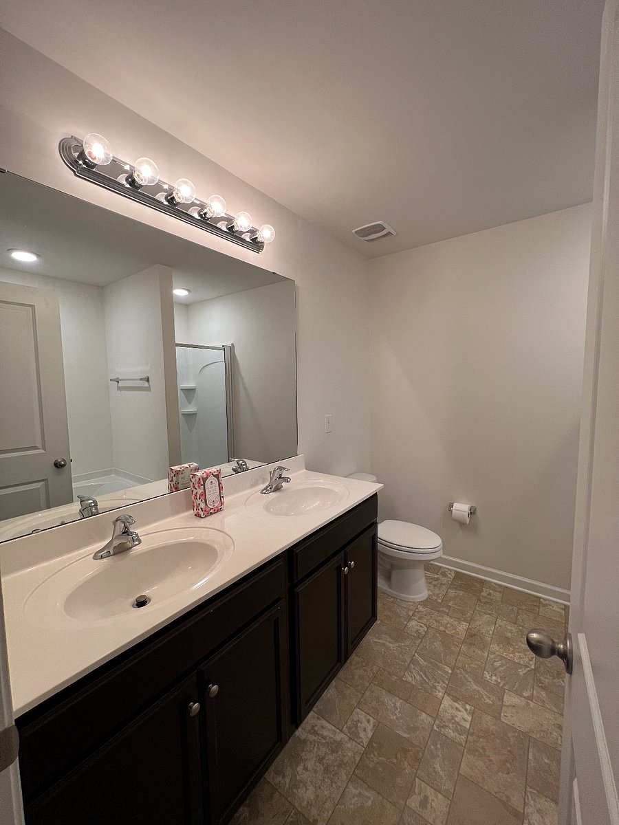 Downstairs bedroom, private bathroom double vanity