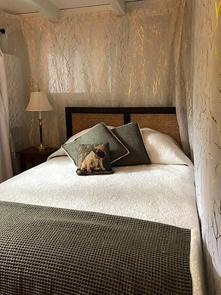 New bed and mattress from Pottery Barn in the sleeping area