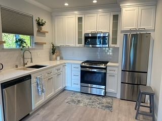 Full appliances: microwave - stove top and oven - full size refrigerator and freezer