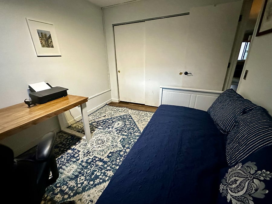 Not only does the daybed have storage, but the bedroom/office also features a large closet.