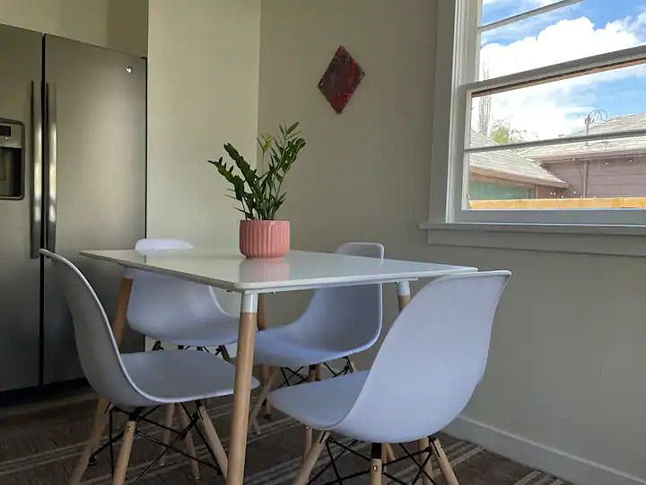 Dining table and full fridge