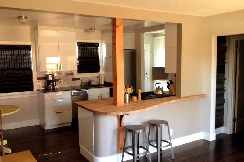 The view of the kitchen from the living room.