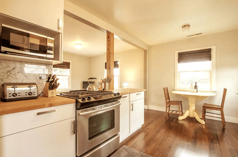 The kitchen is stocked with appliances and everything else you need to feel at home.