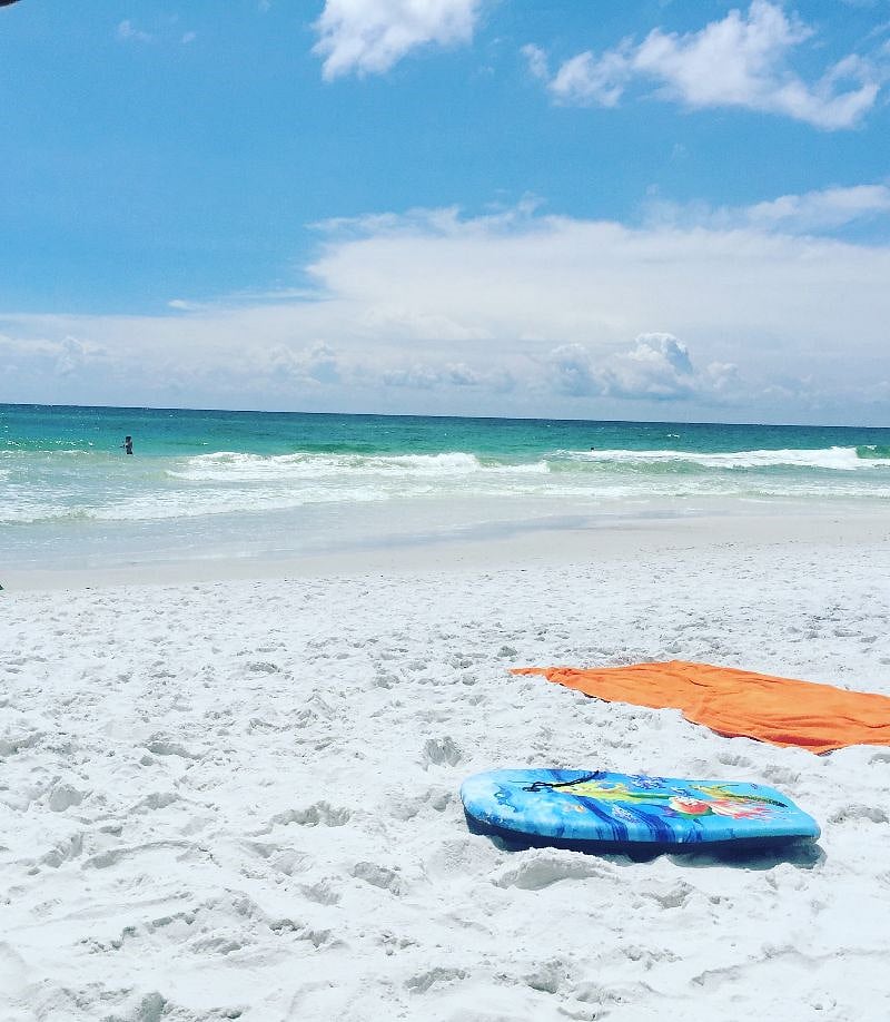 A photo I took on the beach restricted to community owners and guest only. The water and sand are amazing. Beach chairs are provided with your stay. If you prefer beach chair service on the beach it is available for a fee with the on site vendor.