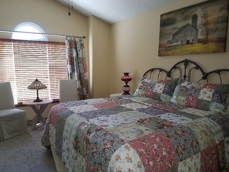 King bed with four piece master attached bath
