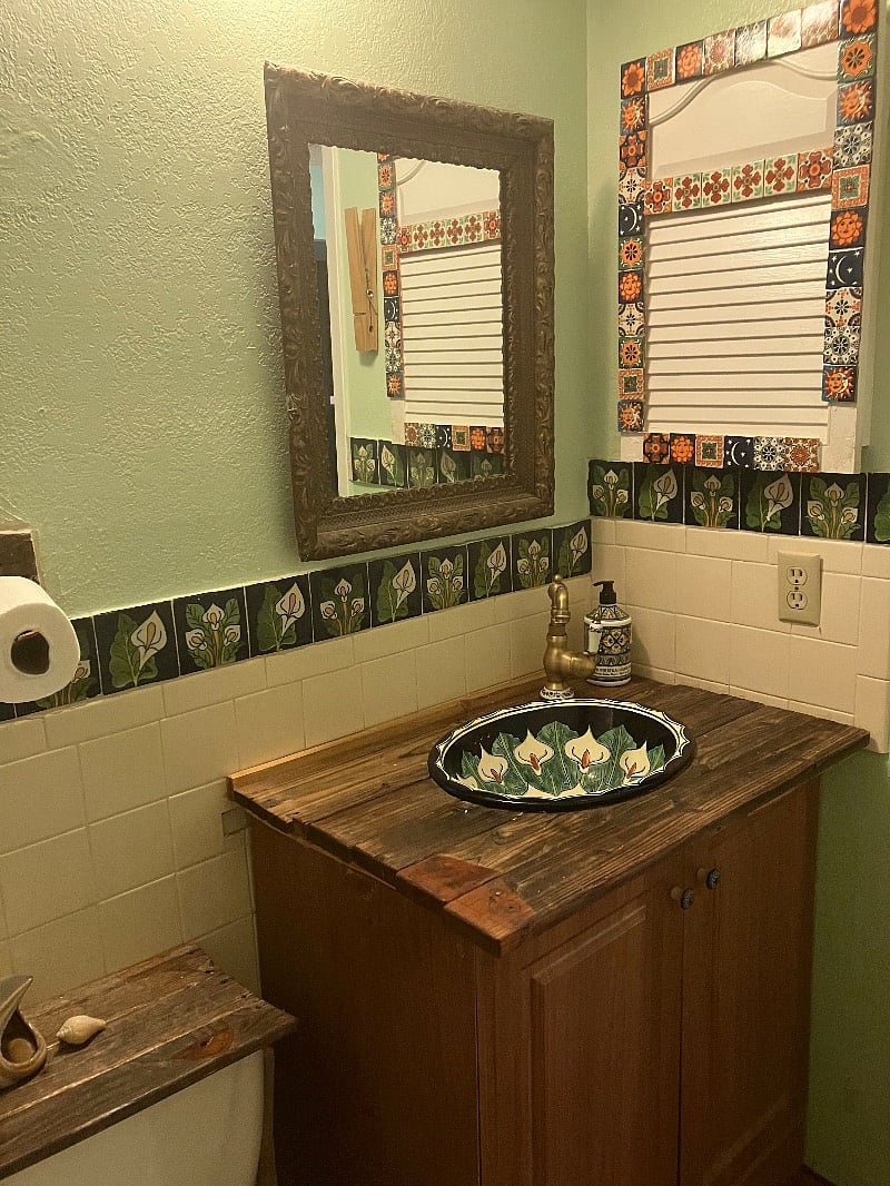 hand made reclaimed wood sink, classic Talavera tile in the Second Bedroom bathroom