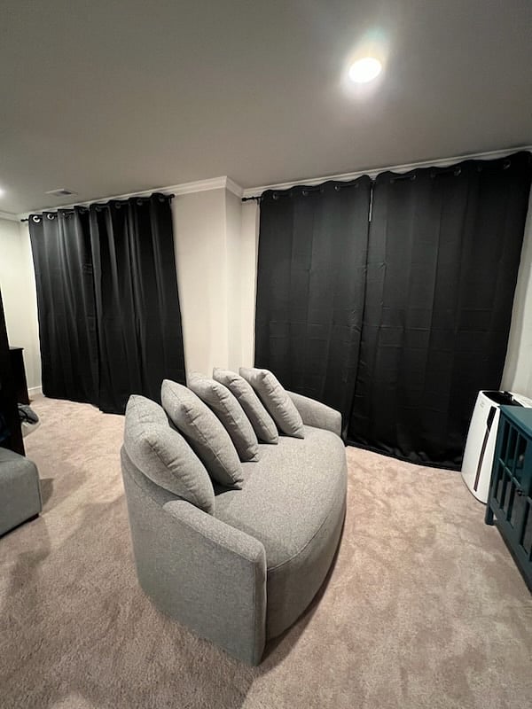 Master sitting, TV, and desk area.