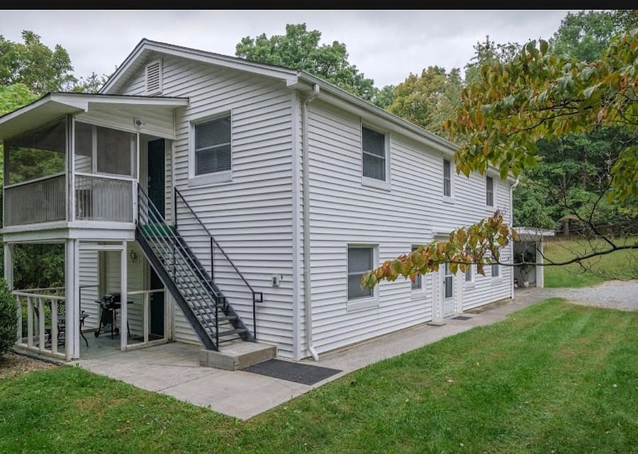 View of the exterior of the house/duplex. Unit is entire upstairs.