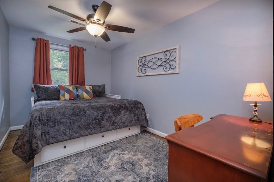 King bedroom with large closet and desk