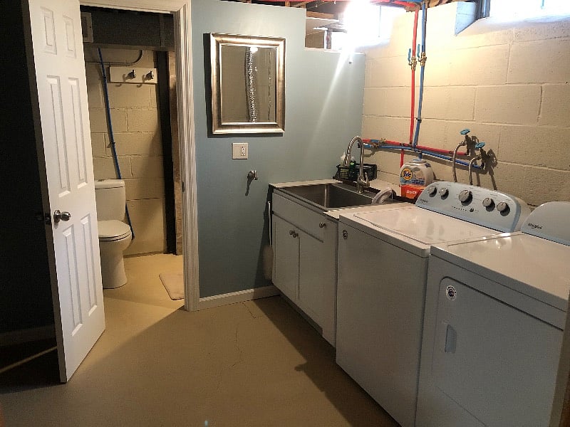 Bathroom 3/3 shower 2/2 next to toilet, laundry for the house (all in basement)