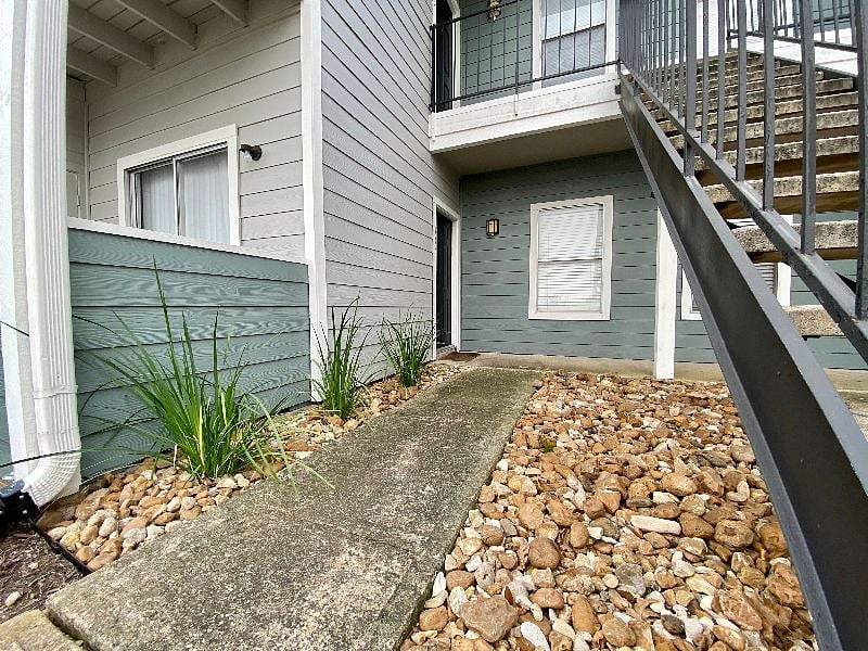 Exterior balcony/patio and front door