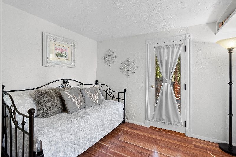 "Bonus" room with trundle bed which has two twin size beds that can come together to make another king size bed. Door leads to private deck.