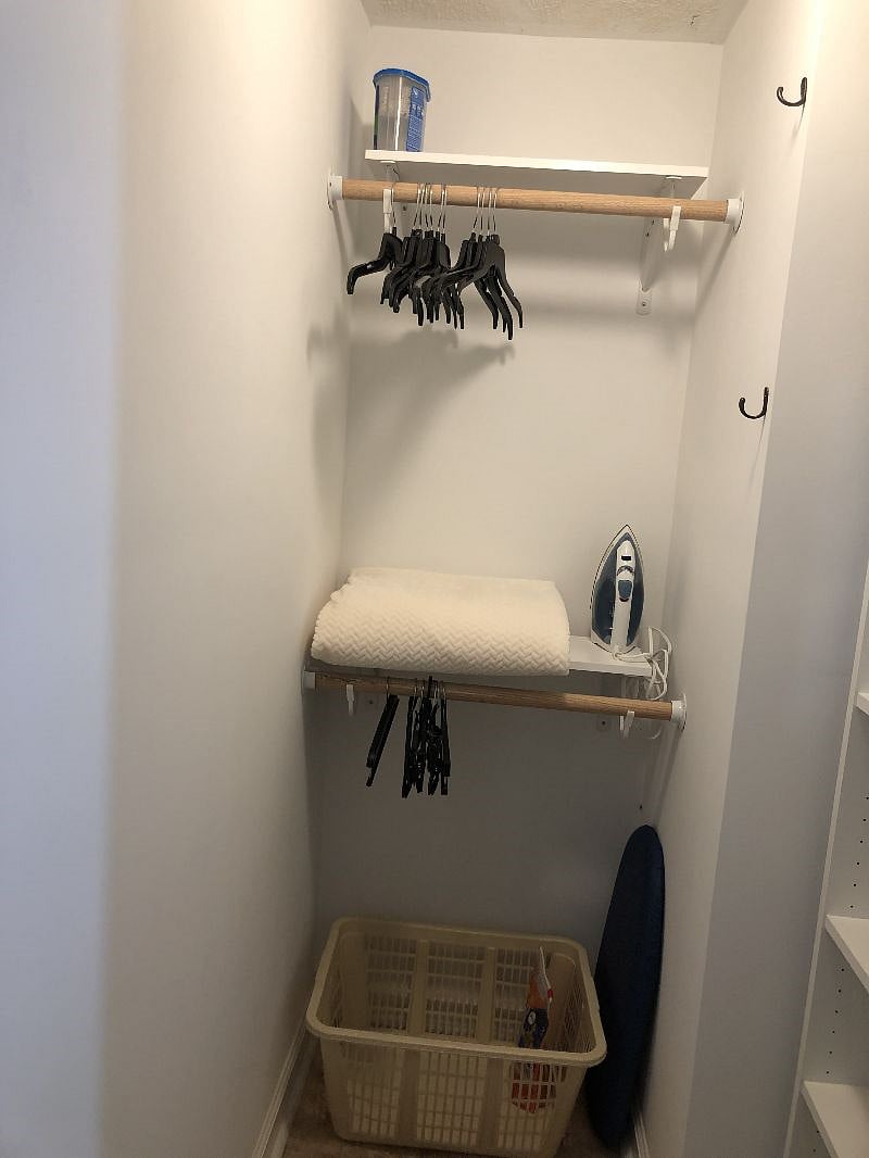 ample hanging space in the custom designed walk in closet