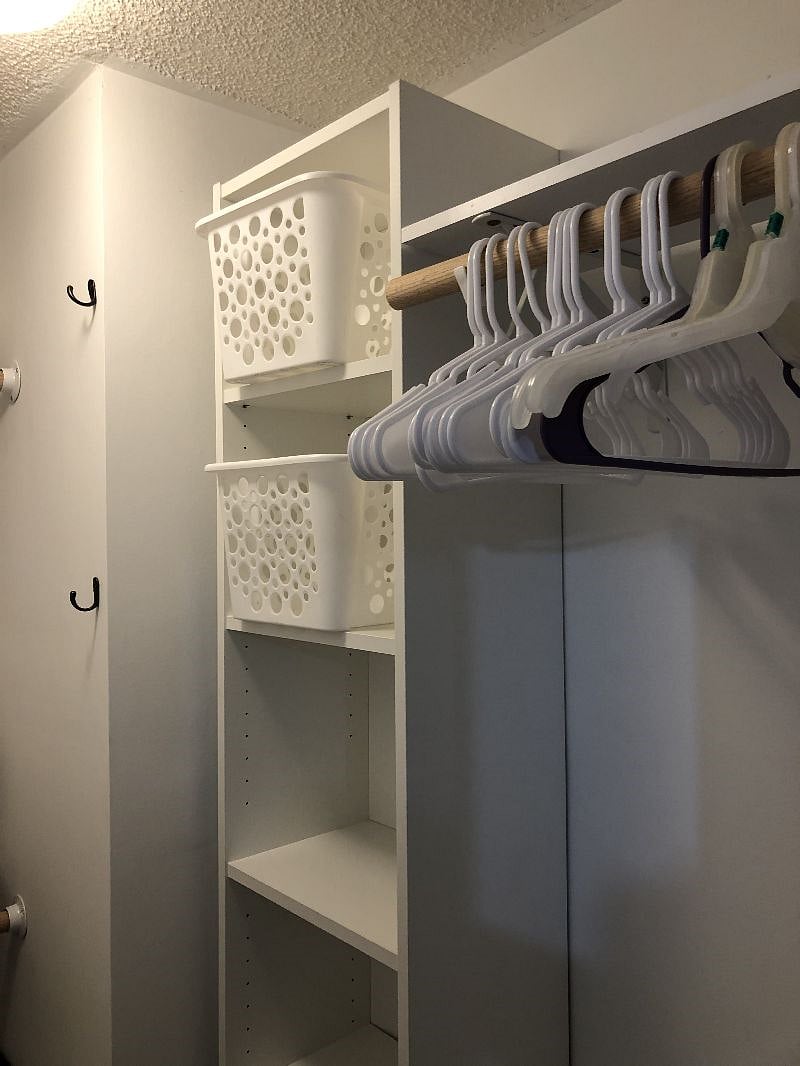 shelves, storage bins, and more hanging space for long items