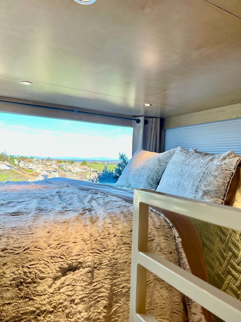 Loft one - queen size bed with under bed storage drawers.