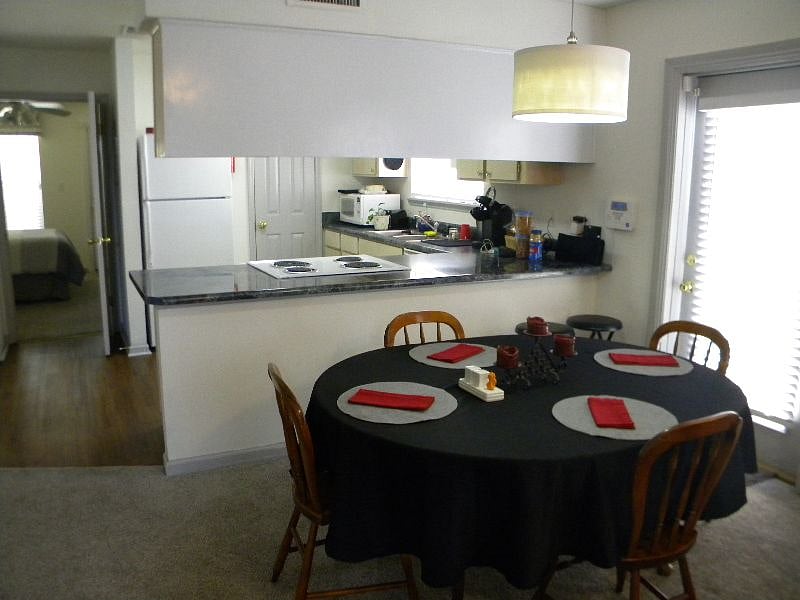 Dining table, extra leaves in laundry, extra chairs in BR