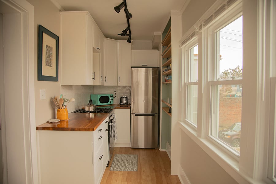 Fully stocked kitchen - (dishes, pots, pans, serving dishes, small kitchen appliances, cooking tools, utensils, glasses, etc)