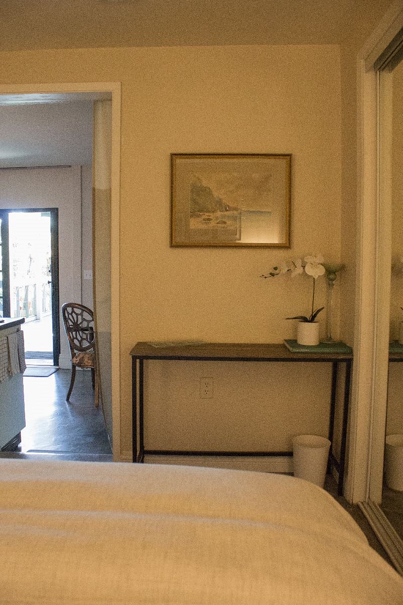 View from the bed looking out. Doorway to bedroom has a curtain for additional light blockage.