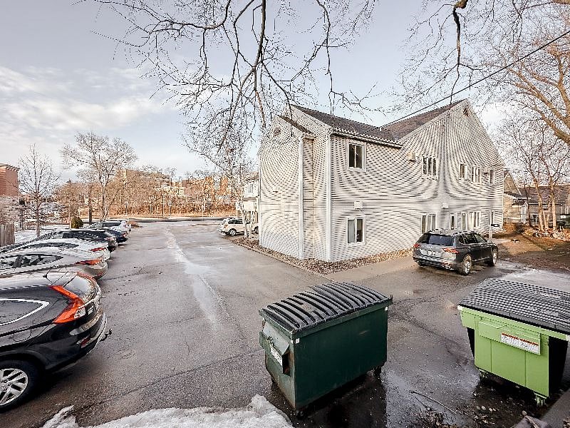 Entrance to apartment is behind building. Rental includes 2 parking spots. UW Hospital can be seen across University Avenue. 4 min walk to a UW Hospital entrance