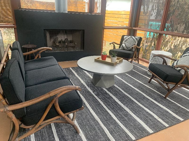 Screened back porch with fire place