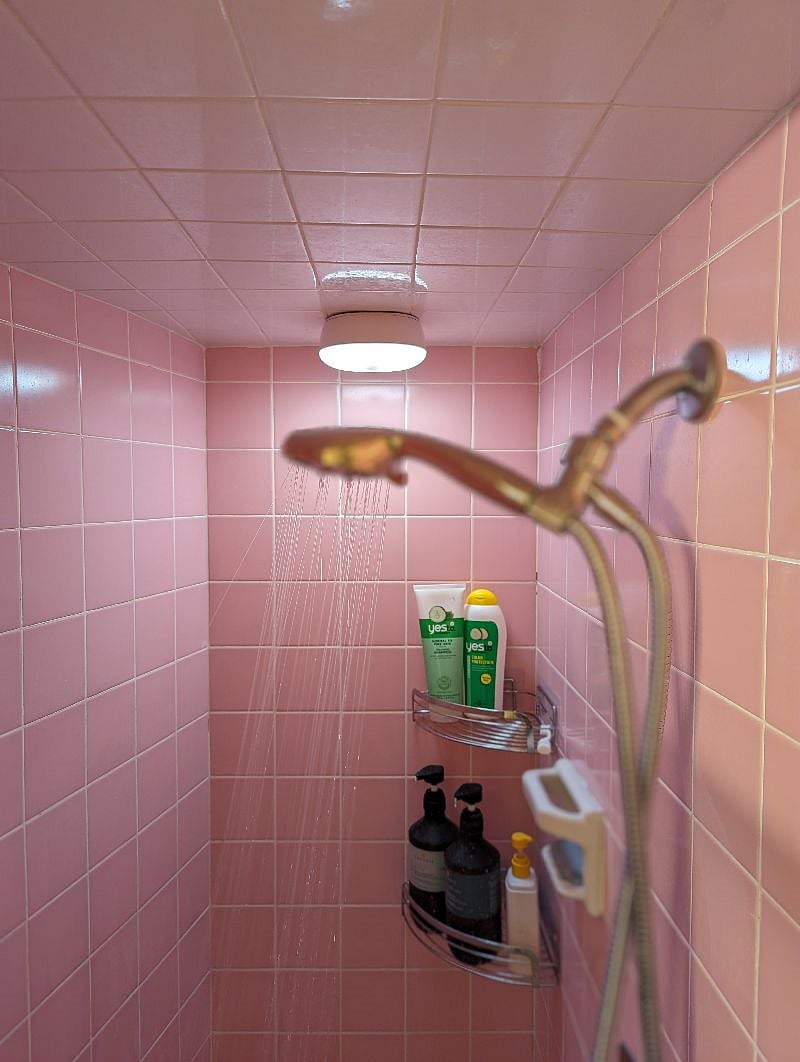 Water Pressure is excellent in my pristine mid-century tiled shower. Shampoo and conditioner options are available to get you started.