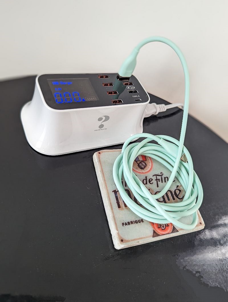 Nightstand charging base for up to 8 devices. 1 complimentary USBC charging cable available.