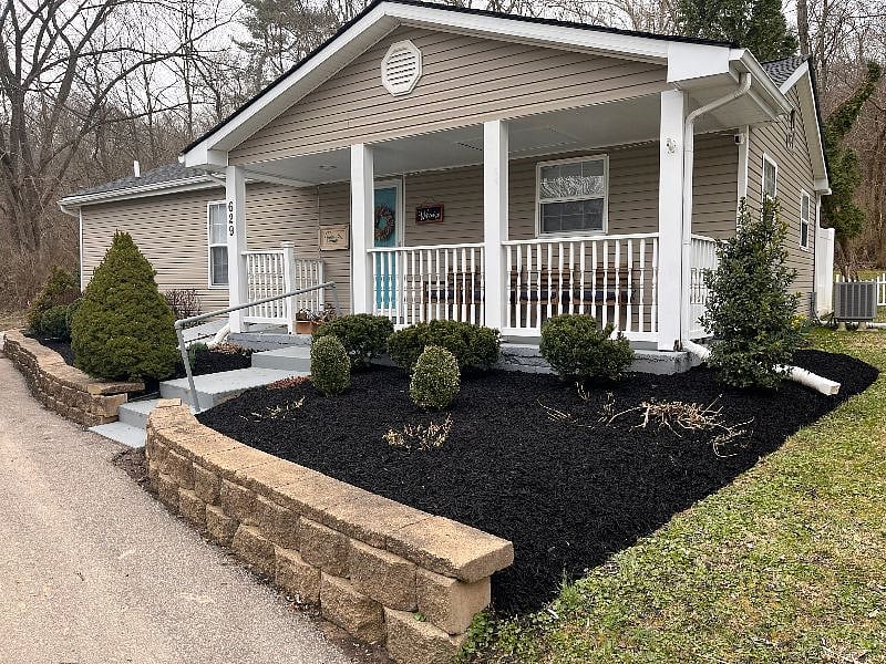 Front of home and private street.
