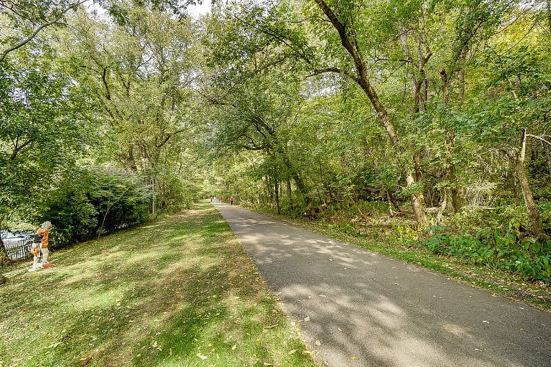 Little Miami Scenic Trail: paved path just off the rear yard. 1/2 walk into town!