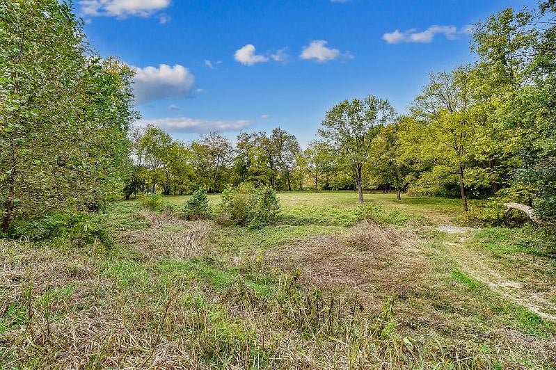 Expansive views of the 4 acre property leading to the river for guests to enjoy.