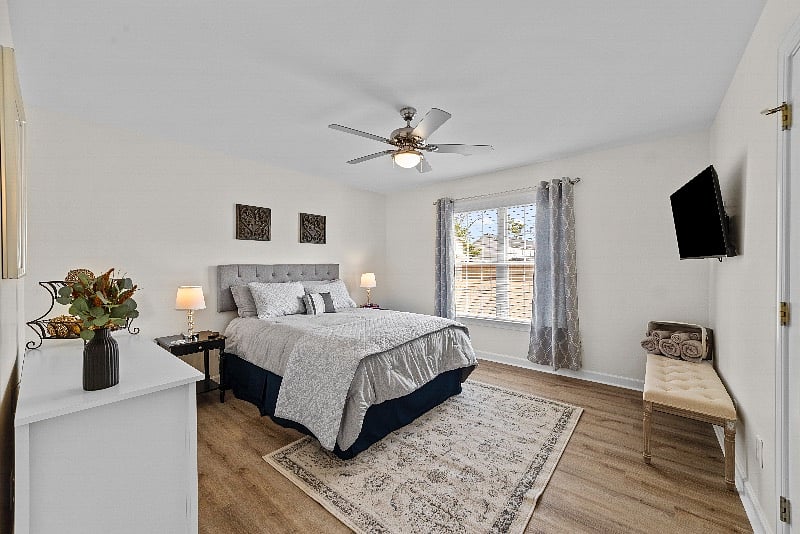 Primary Bedroom has queen-sized bed with mechanical frame.