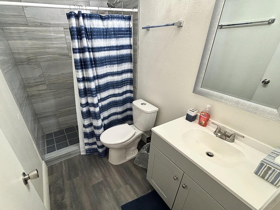 A clean, comfortable bathroom with practical storage for everyday living