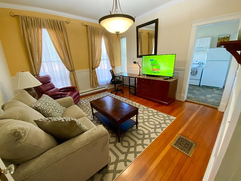 Living room with large flat screen tv