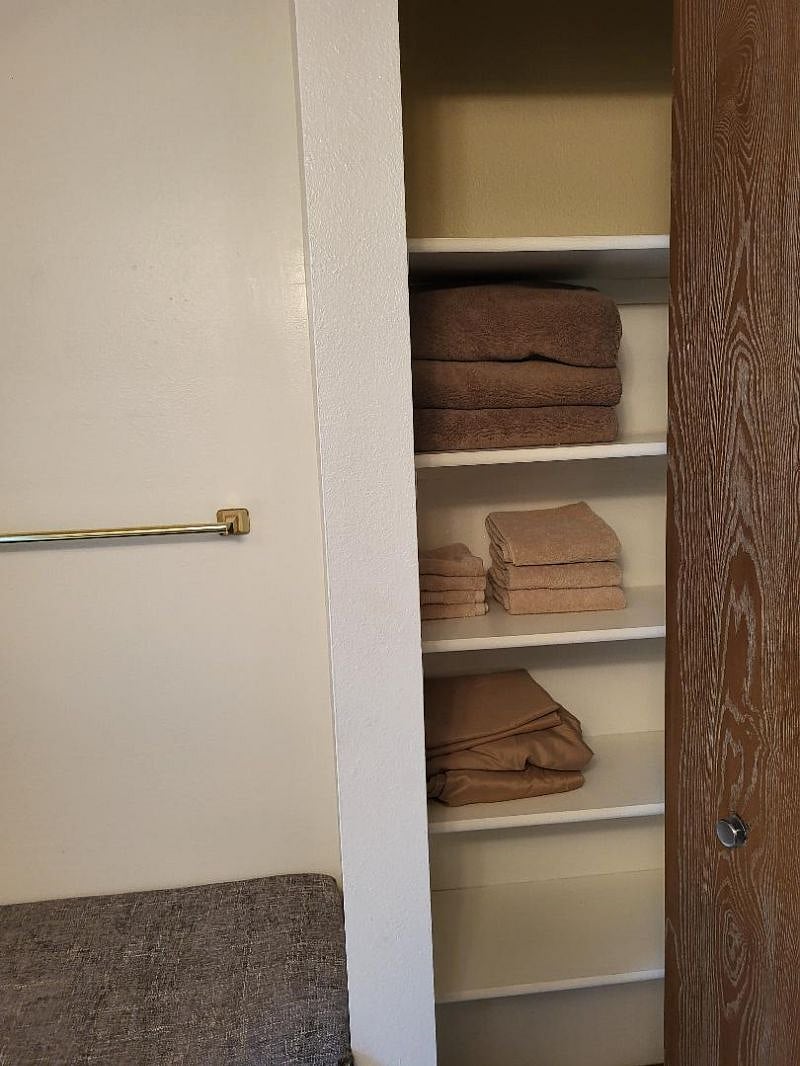 Nice and neat linen and towel storage.