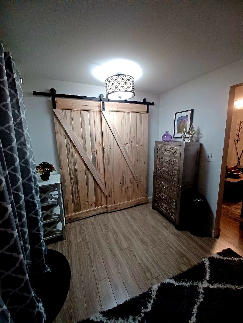 Barn doors made with love in bedroom!