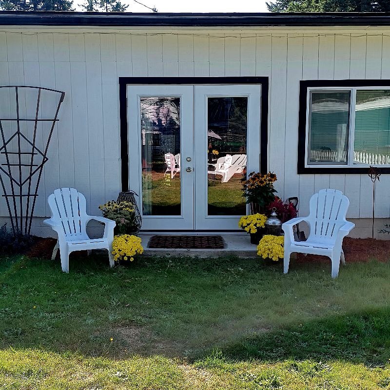 Back yard with French doors going inside.