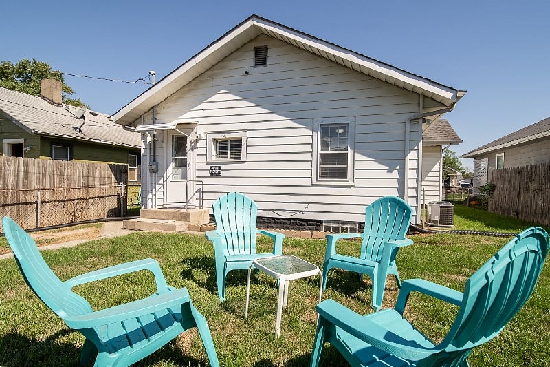 The backyard seating area is a nice place to relax.