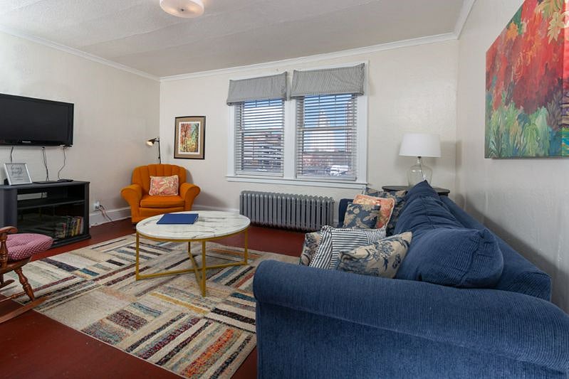 Livingroom of our unit B1, TV included.