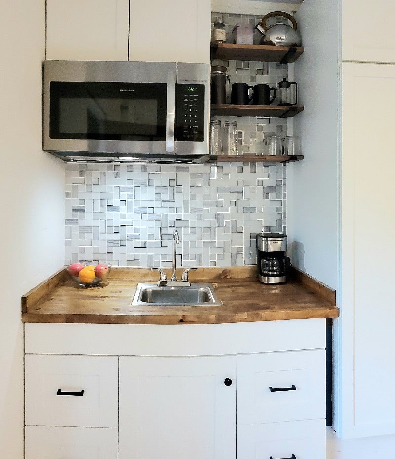 Fully-stocked KITCHENETTE 
- Large refrigerator 
- Large microwave
- Induction cook top
- Large toaster/pizza oven
- Rice cooker
- Air fryer
- Blender
- Electric wok
- Electric skillet
- Crock pot
- Coffee makers (Keurig, Drip & Pour Over)
- Household cleaning supplies
- Robot vacuum, push vacuum & handheld vacuum
- Ironing board, iron, upholstery steamer
