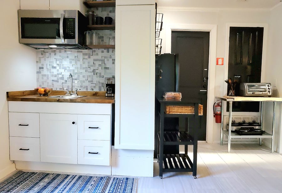 Fully-stocked KITCHENETTE 
- Large refrigerator 
- Large microwave
- Induction cook top
- Large toaster/pizza oven
- Rice cooker
- Air fryer
- Blender
- Electric wok
- Electric skillet
- Crock pot
- Coffee makers (Keurig, Drip & Pour Over)
- Household cleaning supplies
- Robot vacuum, push vacuum & handheld vacuum
- Ironing board, iron, upholstery steamer