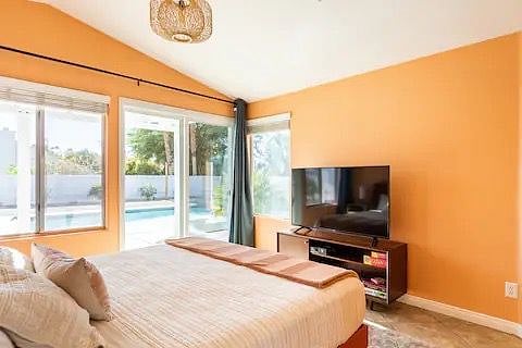 Primary bedroom with King bed and smart tv