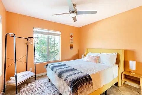 Queen bed with in room desk/workspace