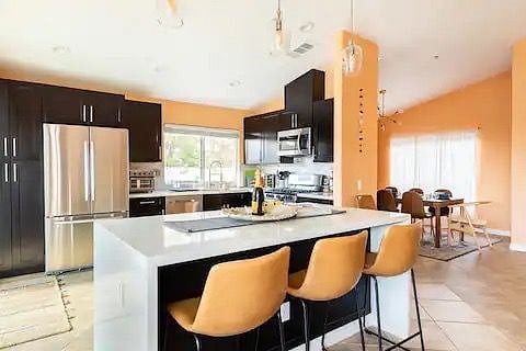USB charging outlets on large kitchen island for counter work space