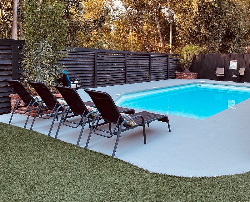 Private pool in fence back yard